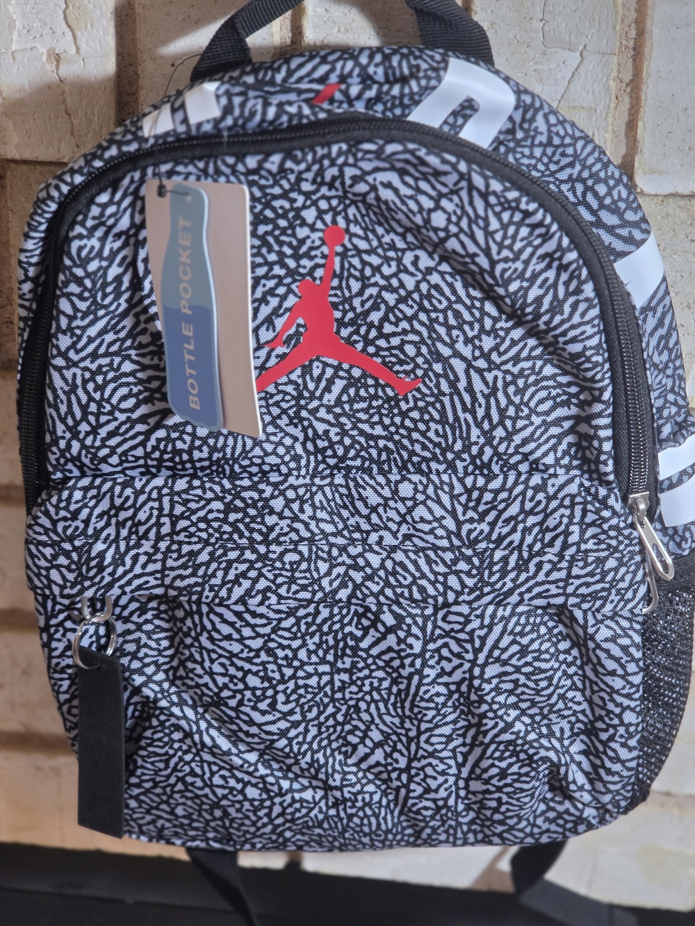 Brand New Nike Black & White Patterned Mini Backpack with Red Logo